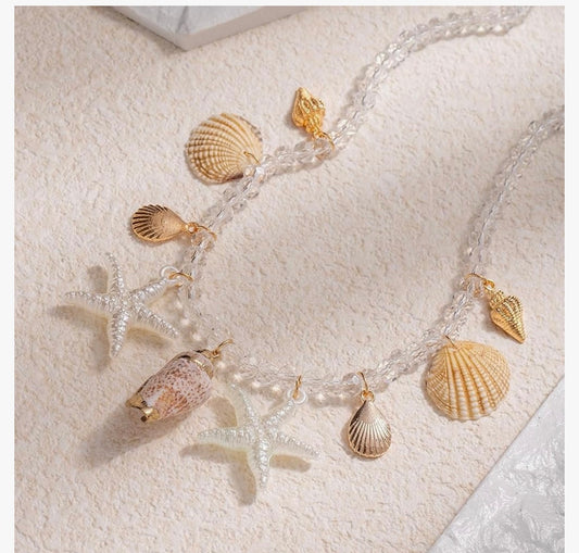 Beach Summer Pearl Shell Necklace for Women Ocean Choker with Gold Plated Sea Star, Conch, and Shell Charms